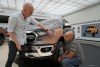 David Dewitt and Pedro Guarinon look over the front fender of the Ford Ranger P375N full-scale model