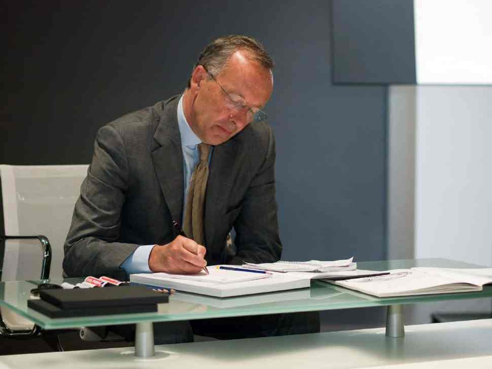 Walter de'Silva sketching at his desk